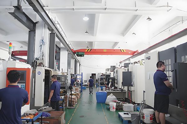 CNC machining workshop work scene scaled