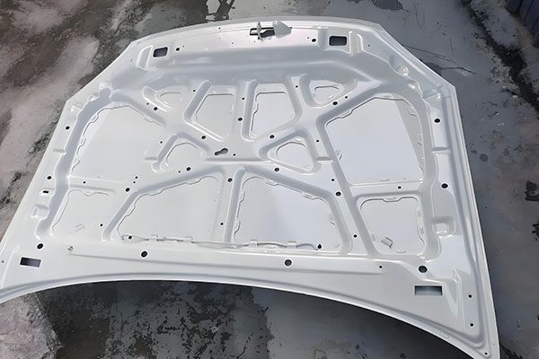 Stiffening ribs on sheet metal assembly
